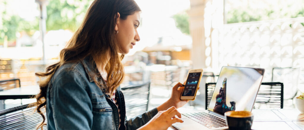 Cafe customer connecting to a WI-Fi hotspot